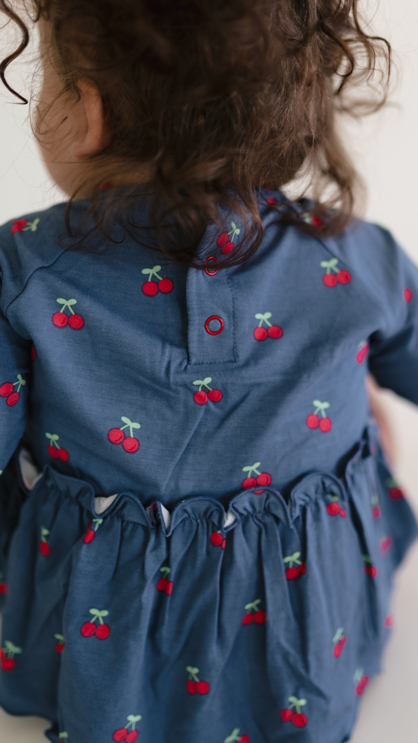 Infant Long Sleeve and Skirt Onesie in Cherries