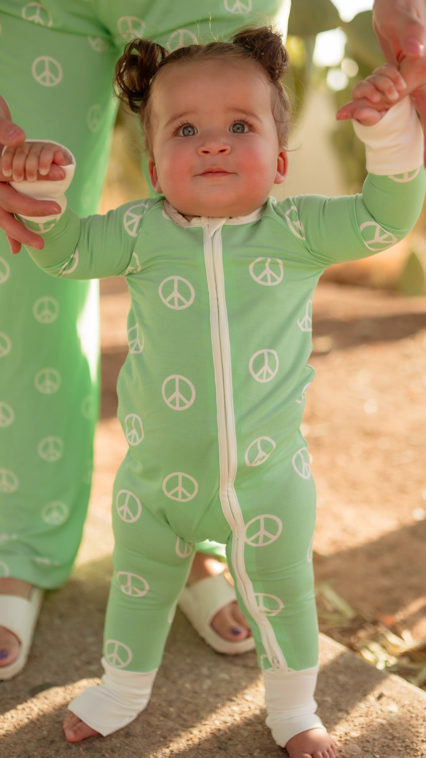 Infant Romper in Groovy Peace Signs