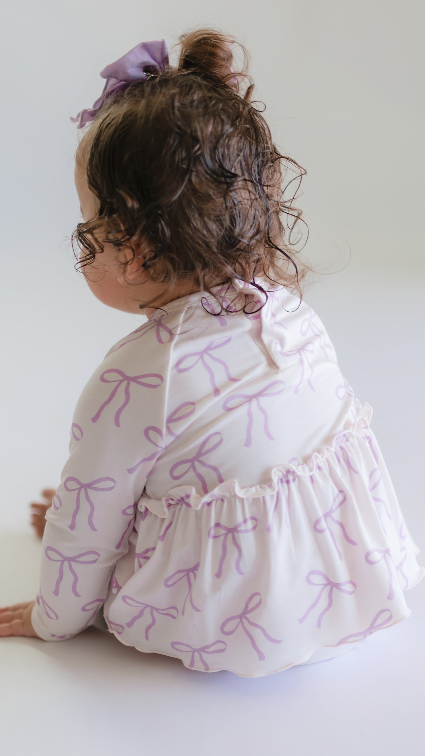 Infant Long Sleeve and Skirt Onesie in Purple Bows