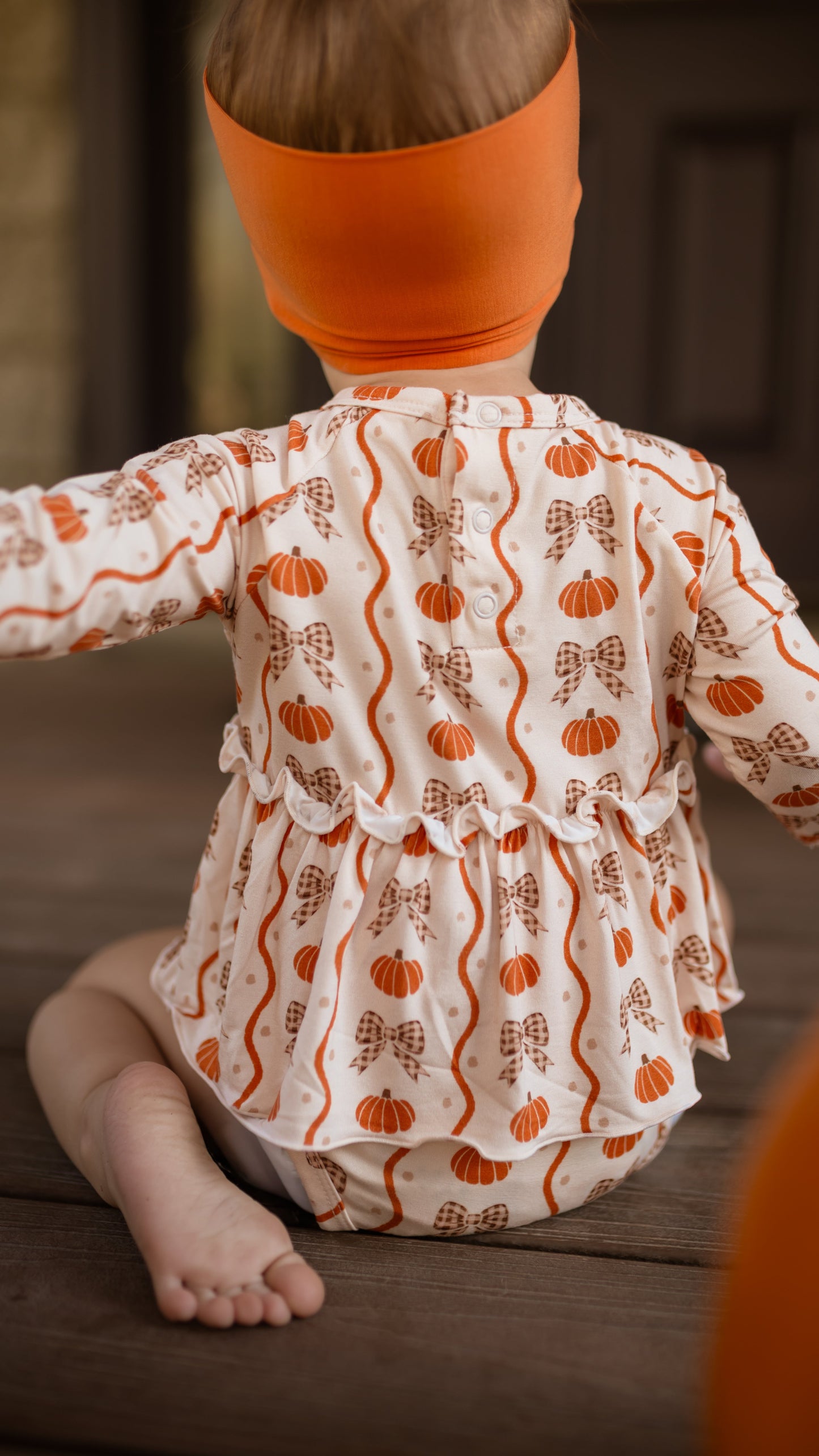Infant Long Sleeve and Skirt Onesie in Bows and Pumpkins